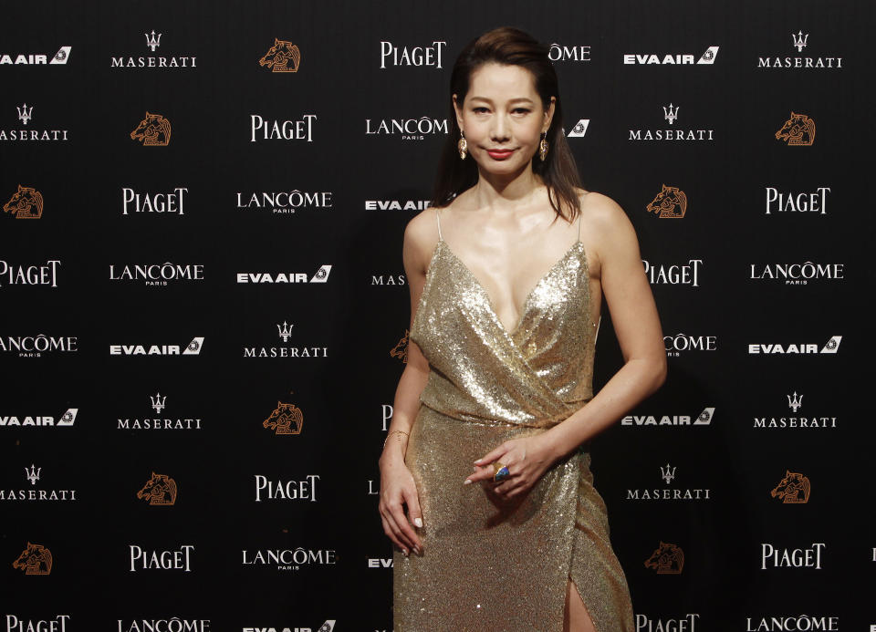 Taiwanese actress Ding Ning arrives at the 55th Golden Horse Awards in Taipei, Taiwan, Saturday, Nov. 17, 2018. Ding is nominated for Best Supporting Actress for the film "Cities of Last Things" at this year's Golden Horse Awards -one of the Chinese-language film industry's biggest annual events. (AP Photo/Chiang YIng-ying)