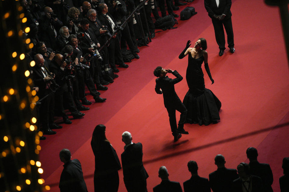 Ethann Isidore, left, and Phoebe Waller-Bridge pose for photographers upon departure from the premiere of the film 'Indiana Jones and the Dial of Destiny' at the 76th international film festival, Cannes, southern France, Thursday, May 18, 2023. (AP Photo/Daniel Cole)