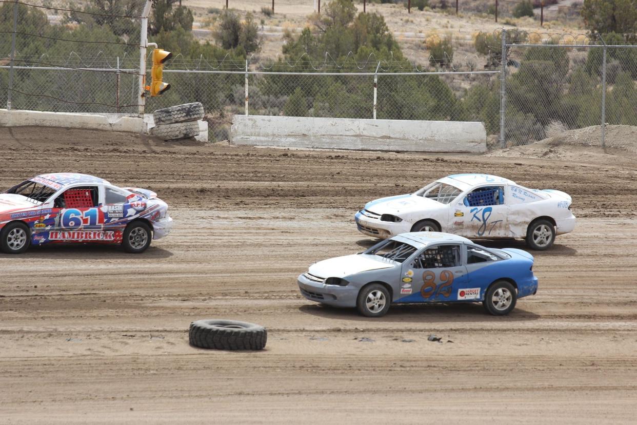 Jimmy Hambrick (#61), Katie Barthel (K8) and Abby Harpole test their cars on April 9, 2022, prior to the start of the racing season at Aztec Speedway.