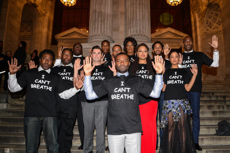 NEW YORK, NY - DECEMBER 14:  (L to R) "Selma" actors E. Roger Mitchell, Wendell Pierce, Omar Dorsey, John Lavelle, Stephan James, Kent Faulcon, David Oyelowo, Lorraine Toussaint, director Ava DuVernay, Tessa Thompson, Andre Holland, and Colman Domingo wear "I Can't Breathe" t-shirts to protest the death of Eric Garner at the New York Public Library on December 14, 2014 in New York City.  (Photo by Ray Tamarra/GC Images)