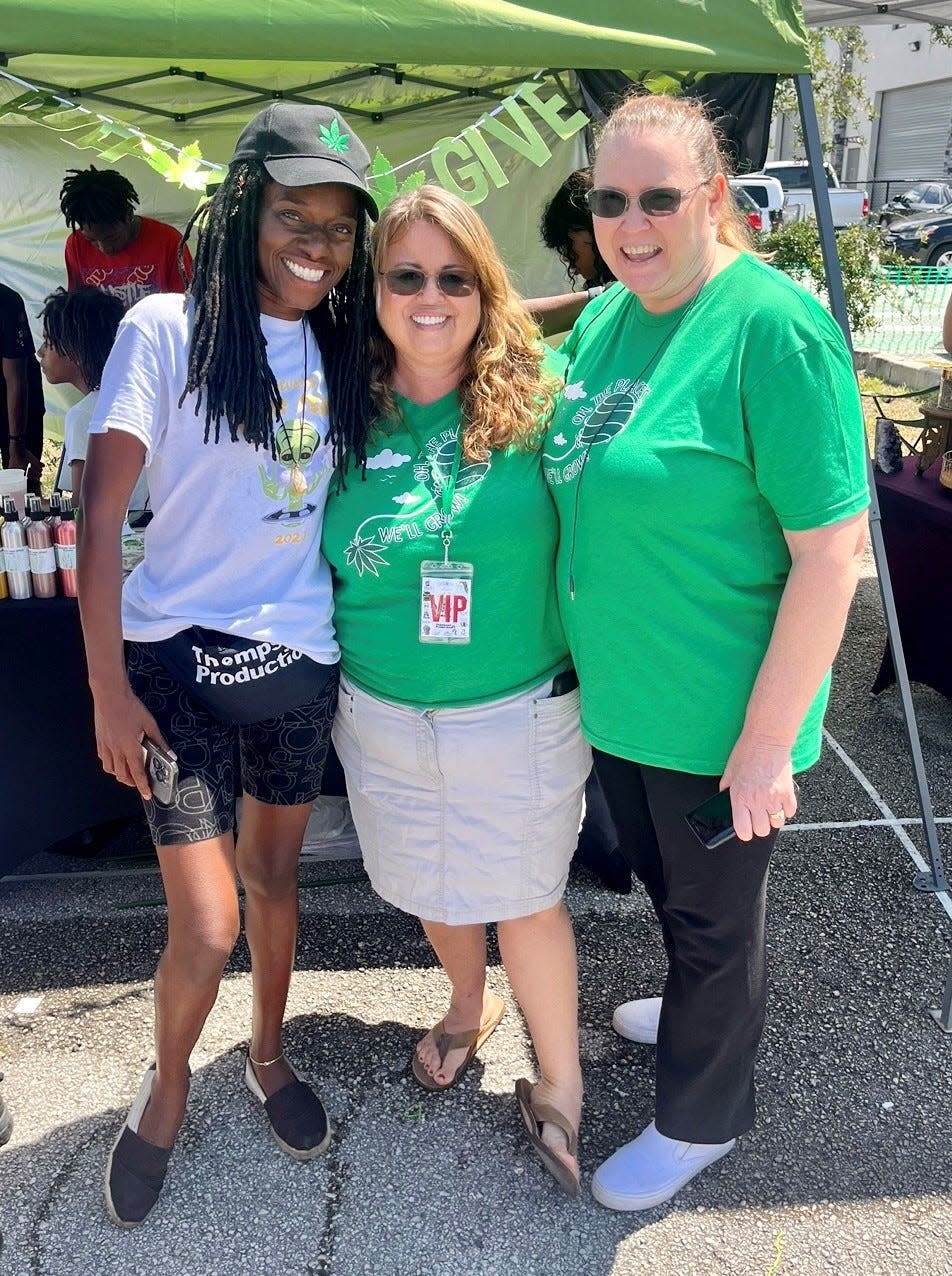 From left, Brevard Hemp Fest organizer Kendra Thompson, Florida Cannabis Action Network President Jodi James and Suzy Childs, the organization's secretary, pose for a photo during the April 22 festival in Melbourne.