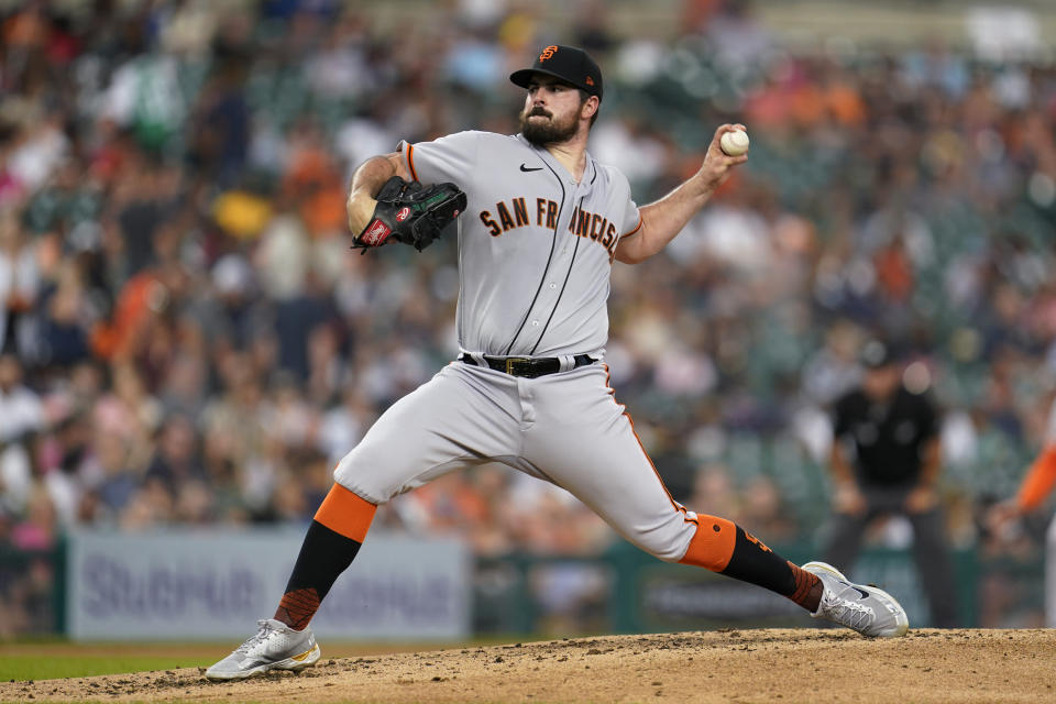 San Francisco Giants pitcher Carlos Rodon throws against the Detroit Tigers in the second inning of a baseball game in Detroit, Tuesday, Aug. 23, 2022. (AP Photo/Paul Sancya)