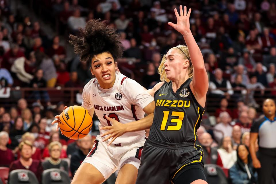 South Carolina Gamecocks guard Brea Beal (12) drives around Missouri Tigers guard Haley Troup (13) in the first half on Jan. 15, 2023, at Colonial Life Arena in Columbia, S.C.