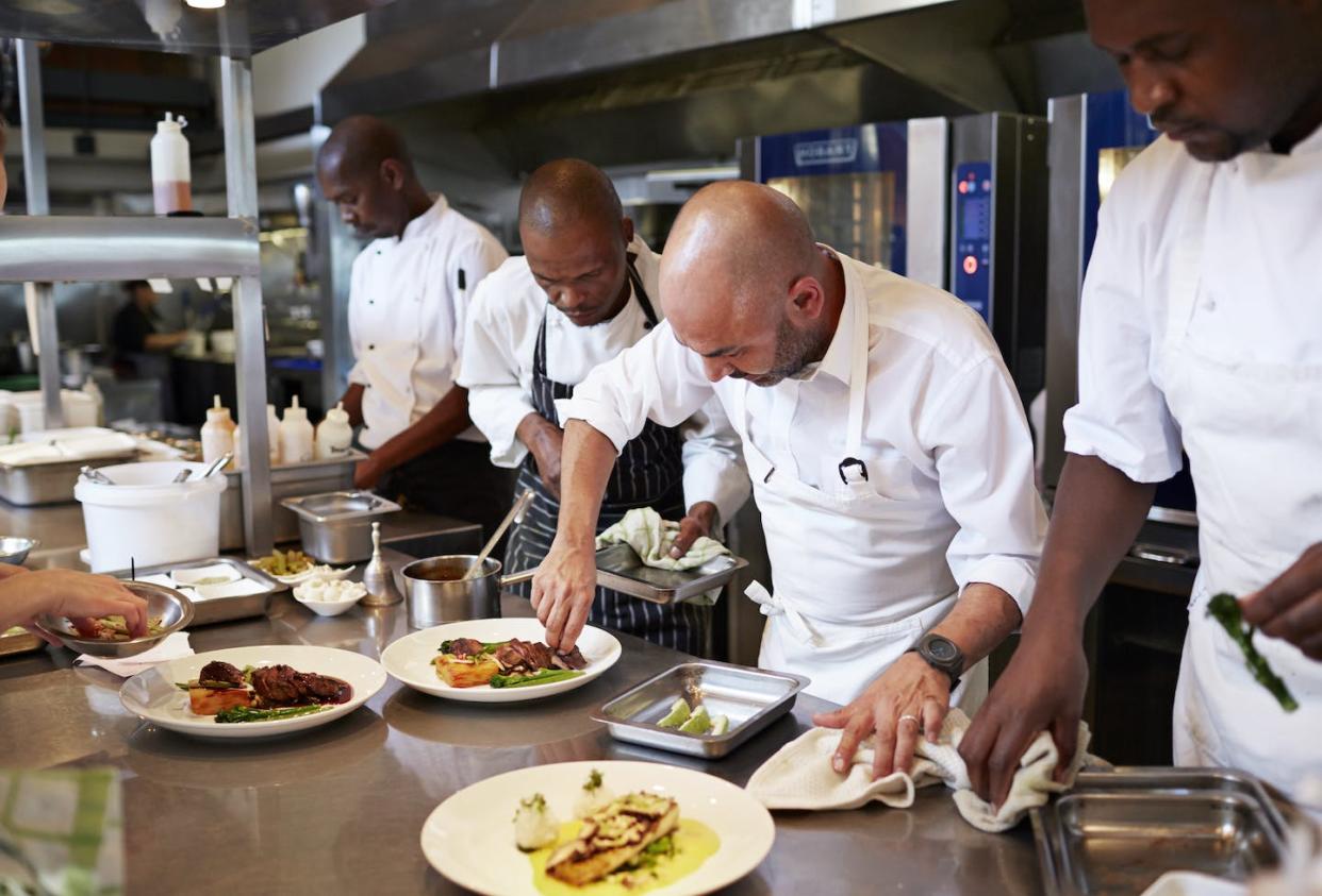 Immigrant chefs feel more constrained in how their food is valued. <a href="https://www.gettyimages.com/detail/photo/chefs-finishing-dishes-at-kitchen-before-serving-royalty-free-image/495199645?phrase=upscale+food+chef&adppopup=true" rel="nofollow noopener" target="_blank" data-ylk="slk:Klaus Vedfelt/DigitalVision via Getty Images;elm:context_link;itc:0;sec:content-canvas" class="link ">Klaus Vedfelt/DigitalVision via Getty Images</a>