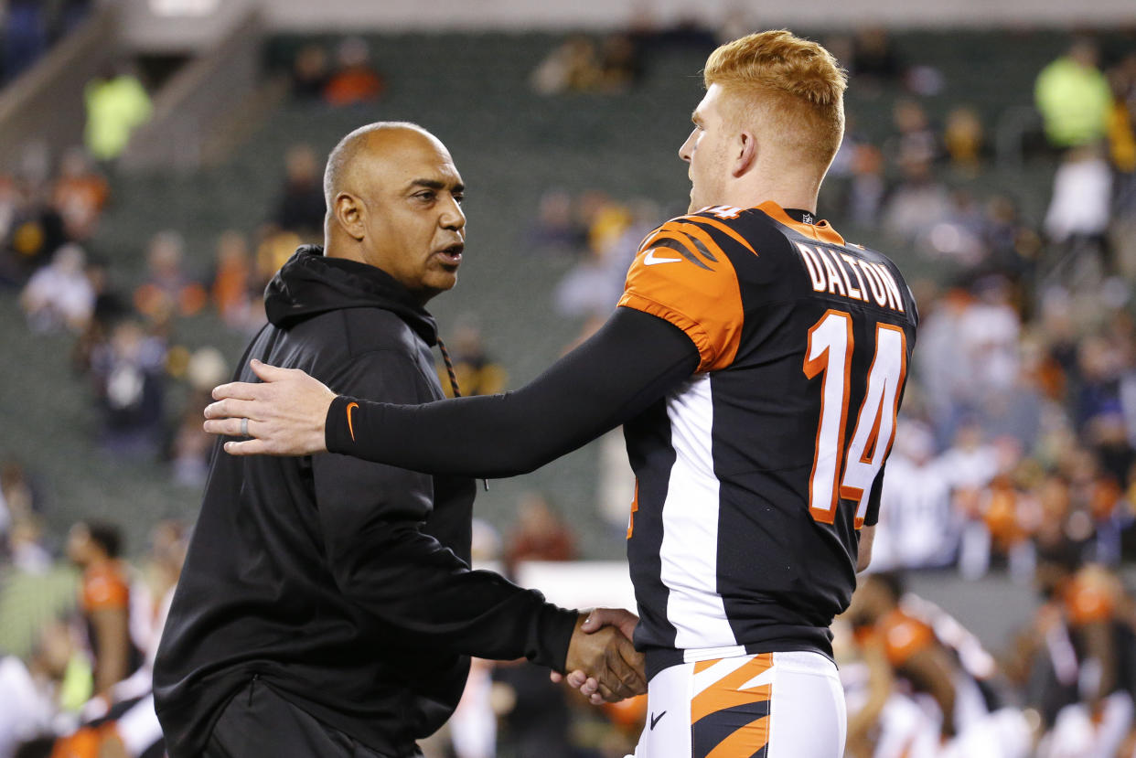 Marvin Lewis and Andy Dalton went 7-9 with the Bengals last season. (AP) 