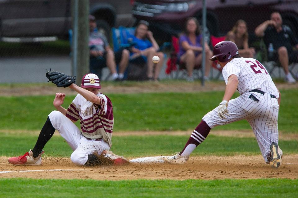 Buchanan's Macoy West steps safely on third base as Brandywine's James Barnes tries to field the throw during the Brandywine vs. Buchanan district baseball game Tuesday, May 31, 2022 at Buchanan High School. 
