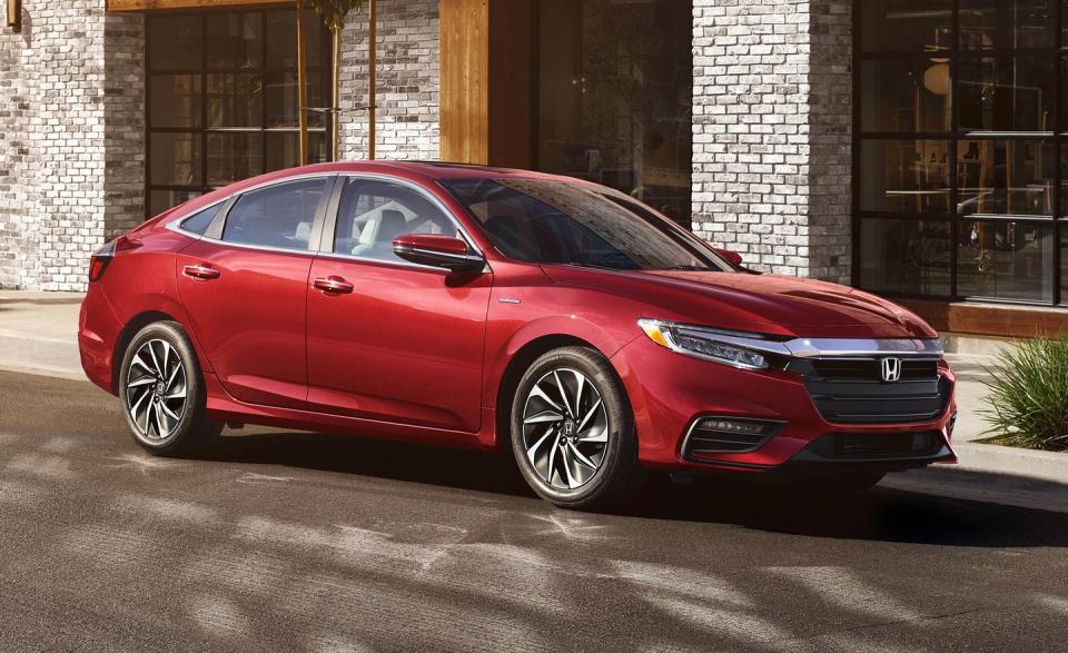 <p>The 2021 Honda Insight is a hybrid with great fuel economy that looks and drives mostly like a conventional compact sedan. It shares many components with the popular <a href="https://www.caranddriver.com/honda/civic" rel="nofollow noopener" target="_blank" data-ylk="slk:Honda Civic sedan;elm:context_link;itc:0;sec:content-canvas" class="link ">Honda Civic sedan</a>, and delivers a similarly pleasant driving experience and roomy, practical interior. The crucial difference is the Insight’s combination of a gasoline engine and electric motors, which supply power in a non-traditional way in the name of efficiency. The hybrid system is seamless during everyday driving but can occasionally be noisy when accelerating hard. But the Insight’s minimal price premium over the Civic and superb fuel economy make it a smart buy.</p><p><a class="link " href="https://www.caranddriver.com/honda/insight-2021" rel="nofollow noopener" target="_blank" data-ylk="slk:Review, Pricing, and Specs;elm:context_link;itc:0;sec:content-canvas">Review, Pricing, and Specs</a></p>