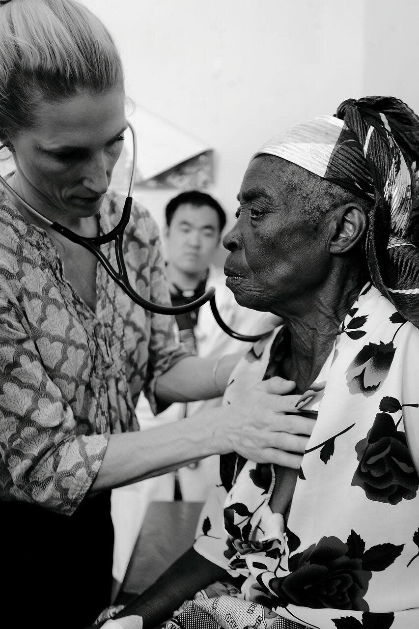 Dr. Vanessa Kerry with a patient in Mangochi, Malawi, in 2018.