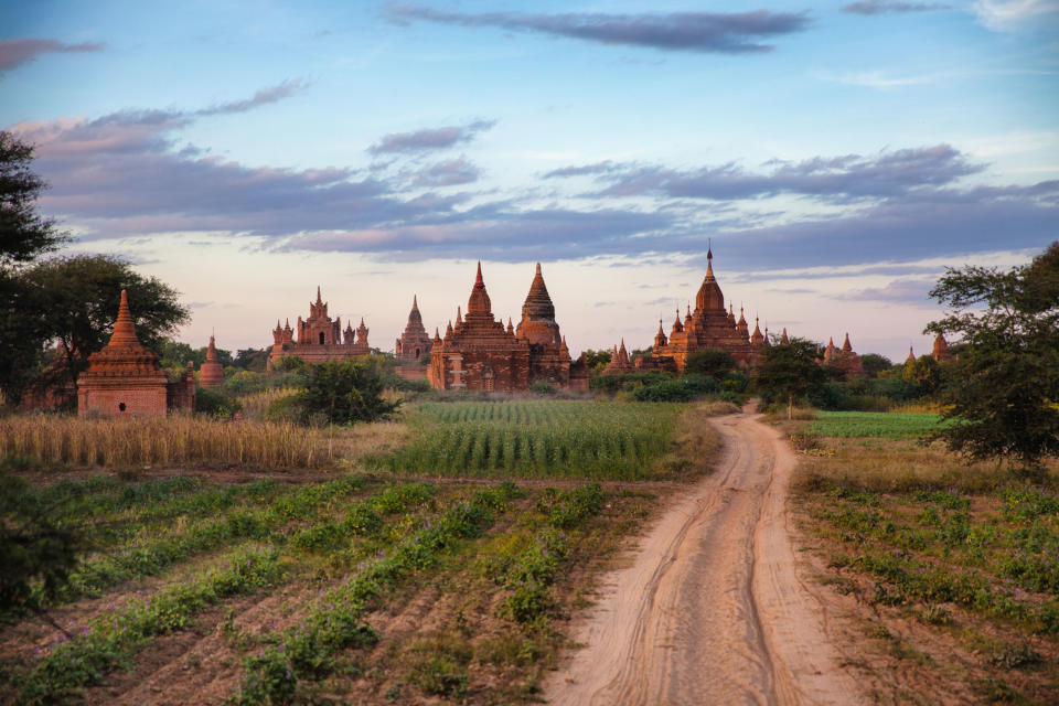 In this December 2012 photo the sun sets over some of the over Pagodas in Bagan, Myanmar. (AP Photo/Richard Camp)