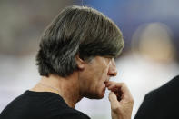 Germany's head coach Joachim Loew bites his nails before the UEFA Nations League soccer match between France and Germany at the Stade de France stadium in Saint Denis, north of Paris, Tuesday, Oct. 16, 2018. (AP Photo/Francois Mori)