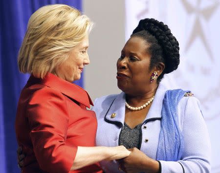 Democratic presidential candidate Hillary Clinton (L) greets Congresswoman Sheila Jackson Lee prior to receiving the Barbara Jordan Public-Private Leadership Award at Texas Southern University in Houston, Texas June 4, 2015. REUTERS/Donna Carson