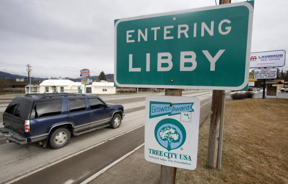 FILE - In this file photo taken Feb. 16, 2010, the town of Libby Mont., is shown. W.R. Grace, Inc., the chemical company blamed for polluting Libby, Mont. with asbestos dust that has killed hundreds of people, is pushing back against the Environmental Agency proposal and seeking to have it revised. Attorneys and scientists for W.R. Grace Inc., which operated an asbestos mine in Libby for three decades, say the EPA proposal would frustrate cleanup efforts by setting an unattainable standard for exposures. (AP Photo/Rick Bowmer,File)