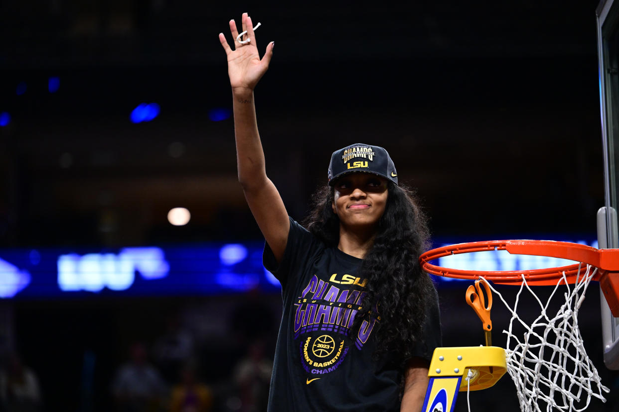 DALLAS, TX - APRIL 02: Angel Reese #10 of the Louisiana State Tigers cuts down the net after their win over the Iowa Hawkeyes during the 2023 NCAA Women's Basketball Tournament National Championship at American Airlines Center on April 2, 2023 in Dallas, Texas. (Photo by Ben Solomon/NCAA Photos via Getty Images)