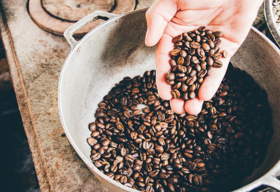 Scientists say that wasting coffee and water while making a cup of coffee has a larger carbon footprint than using coffee capsules. (Unsplash)