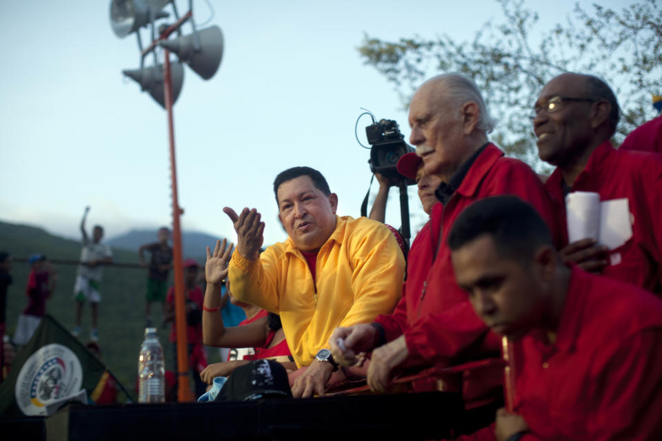 Venezuela's President Hugo Chavez waves to supporters during a campaign rally in Guarenas, Venezuela, Saturday, Sept. 29, 2012. Venezuela's presidential election is scheduled for Oct. 7. (AP Photo/Rodrigo Abd)