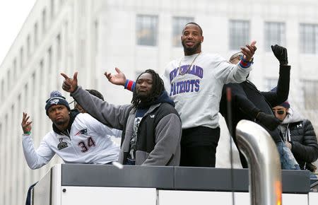 Feb 4, 2015; Boston, MA, USA; New England Patriots running back Shane Vereen (left) running back LeGarrette Blount (second left) and running back Jonas Gray (second right) during the Super Bowl XLIX victory parade. Stew Milne-USA TODAY Sports