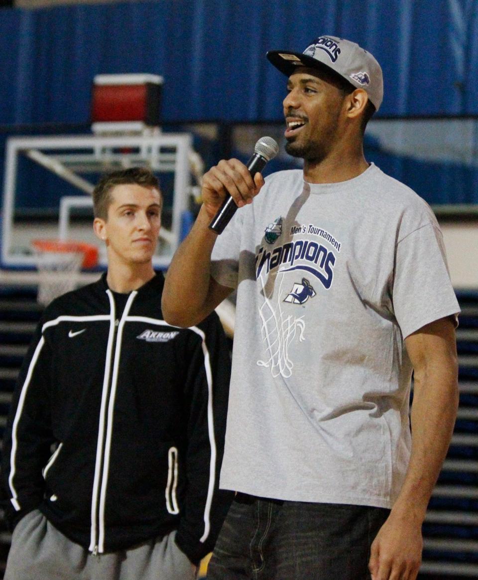 Akron's  Brian Walsh (left) and Zeke Marshall address the crowd during the University of Akron's NCAA Tournament Selection Show Watch Party at Rhodes Arena on March 17, 2013.