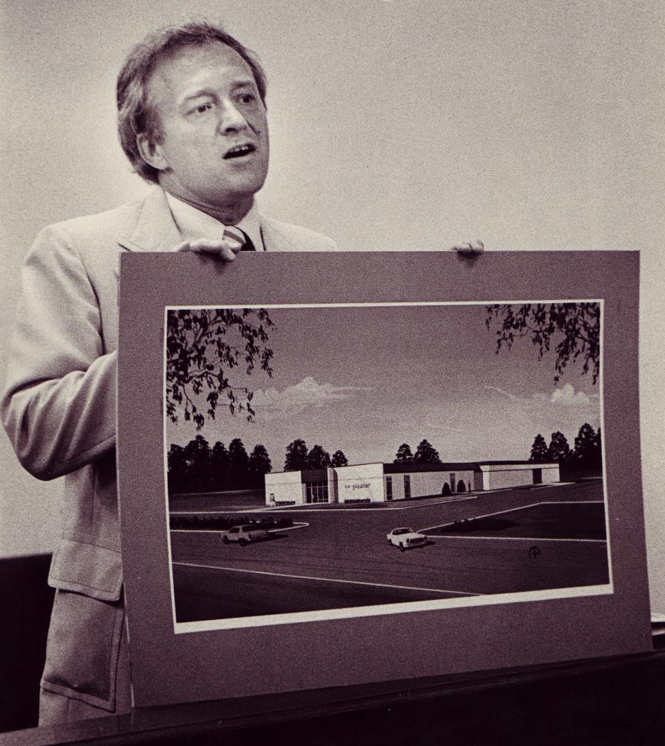 Gleaner publisher Walt Dear shows the Henderson Zoning Board plans for a new newspaper office at 455 Klutey Park Plaza in the mid-1970s. The office opened in 1976. The Gleaner operated there for 44 years before closing in July 2020.