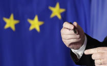 European Commission President Jean-Claude Juncker gets ink on his hands as he signs a declaration with the original 1957 pen of the Rome Treaty during an EU summit meeting at the Orazi and Curiazi Hall in the Palazzo dei Conservatori in Rome on Saturday, March 25, 2017. European Union leaders were gathering in Rome to mark the 60th anniversary of their founding treaty and chart a way ahead following the decision of Britain to leave the 28-nation bloc. (AP Photo/Alessandra Tarantino)