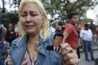 Photo Par Juan Barreto - Le président Hugo Chavez, âgé de 58 ans et à la tête du Venezuela depuis près de 15 ans, vient de décéder des suites d'un cancer qui l'avait tenu éloigné du pouvoir depuis plusieurs mois