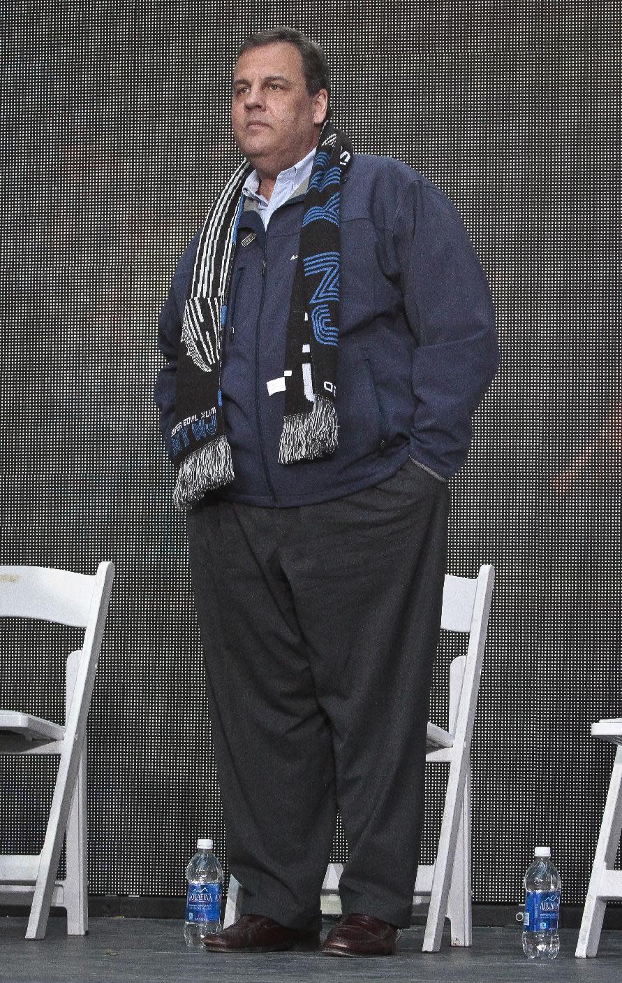 New Jersey Gov. Chris Christie waits for the start of a ceremony to pass official hosting duties of next year's Super Bowl to representatives from Arizona, Saturday Feb. 1, 2014 in New York. Fellow Republicans are assessing the damage of new allegations that Gov. Christie knew about a traffic-blocking operation orchestrated by top aides.(AP Photo/Bebeto Matthews)