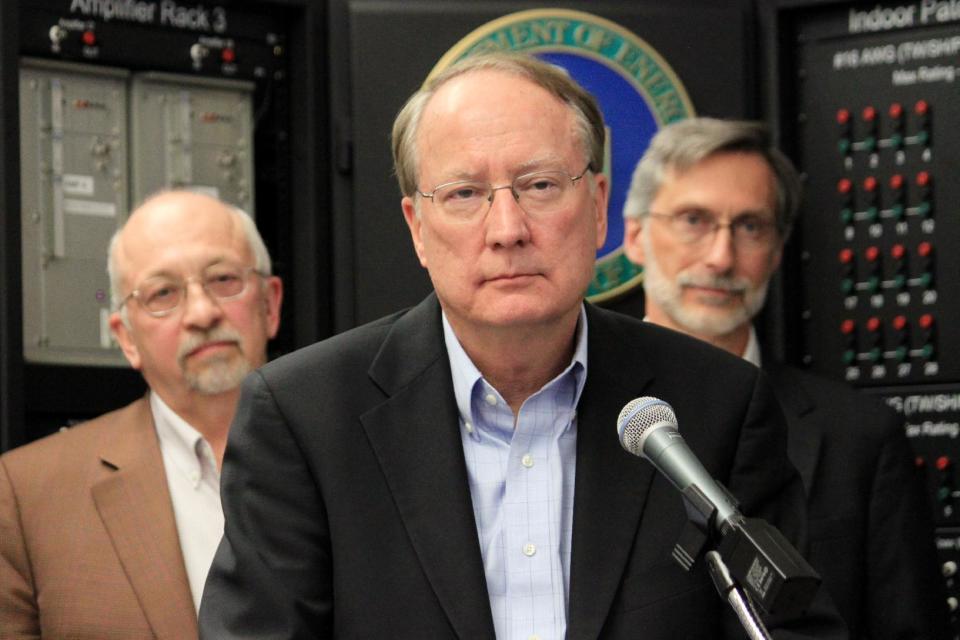 National Nuclear Security Administration Director Frank Klotz, center, listens to reporters' questions during a new conference at Sandia National Laboratories in Albuquerque, N.M., on Thursday, May 8, 2014. (AP Photo/Susan Montoya Bryan)