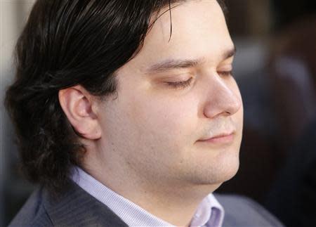 Mark Karpeles, chief executive of Mt. Gox, attends a news conference at the Tokyo District Court in Tokyo February 28, 2014. Mt. Gox, once the world's biggest bitcoin exchange, filed for bankruptcy protection on Friday, saying it may have lost all of its investors' virtual coins due to hacking into its faulty computer system. REUTERS/Yuya Shino