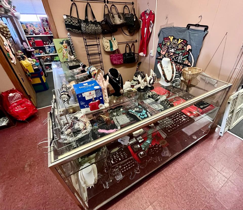 A display case full of costume jewelry is now at the 45 School St. temporary location of Taunton Antiques Center.