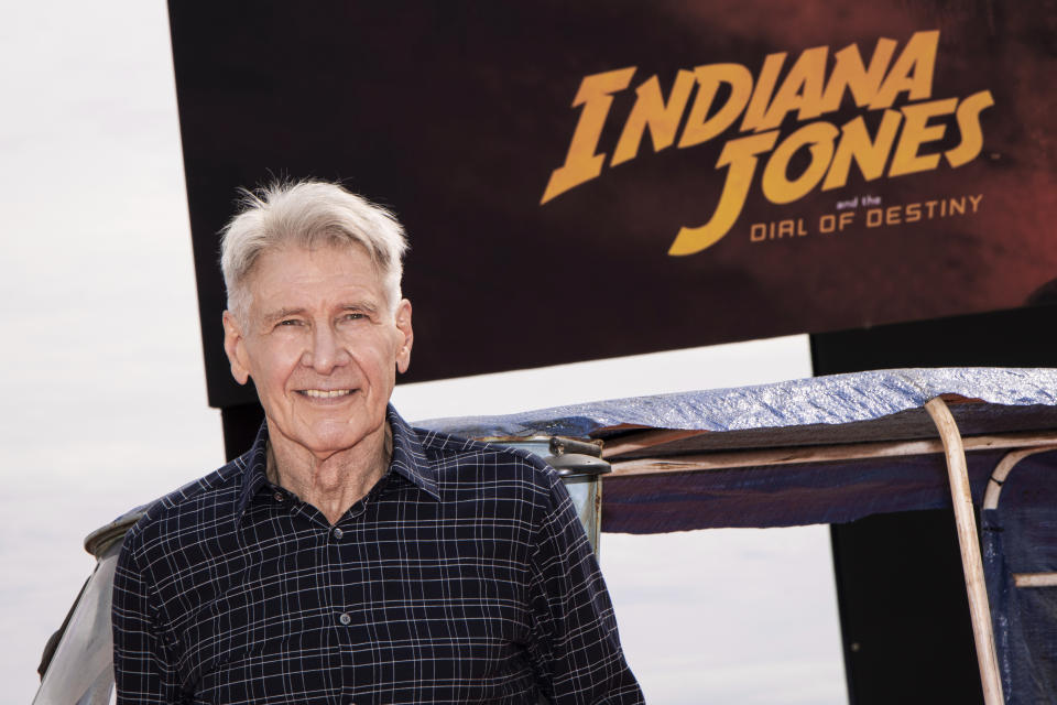 Harrison Ford poses for photographers at the photo call for the film 'Indiana Jones and the Dial of Destiny' at the 76th international film festival, Cannes, southern France, Thursday, May 18, 2023. (Photo by Vianney Le Caer/Invision/AP)