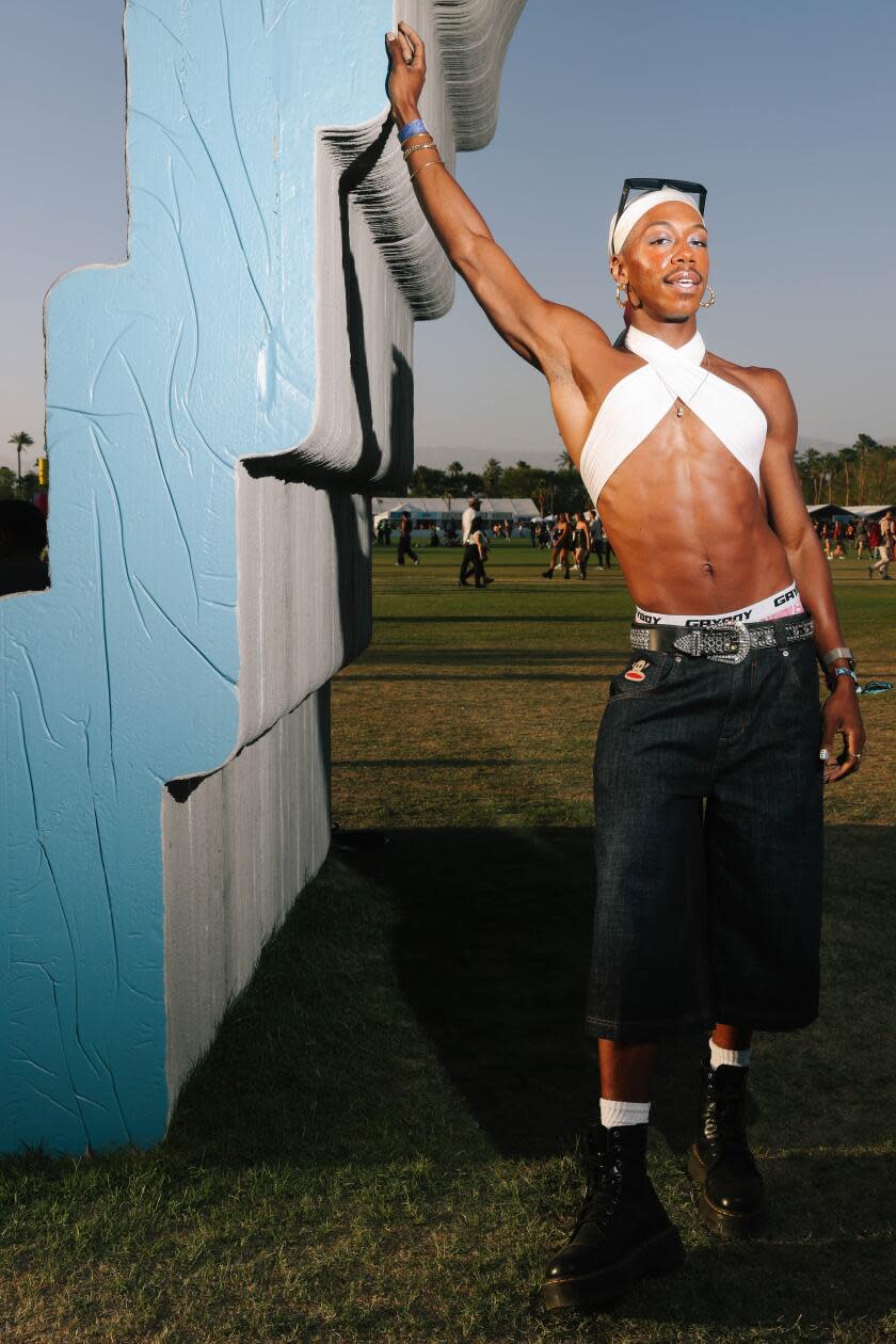 Chaz Gordon poses for a portrait wearing a few thrifted pieces and shorts that are from the Jaded brand. He wanted to be comfortable but look cute.