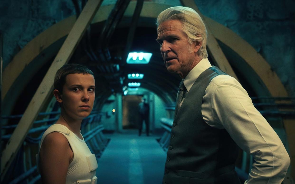 Millie Bobby Brown as Eleven and Matthew Modine as Dr Martin Brenner - Netflix