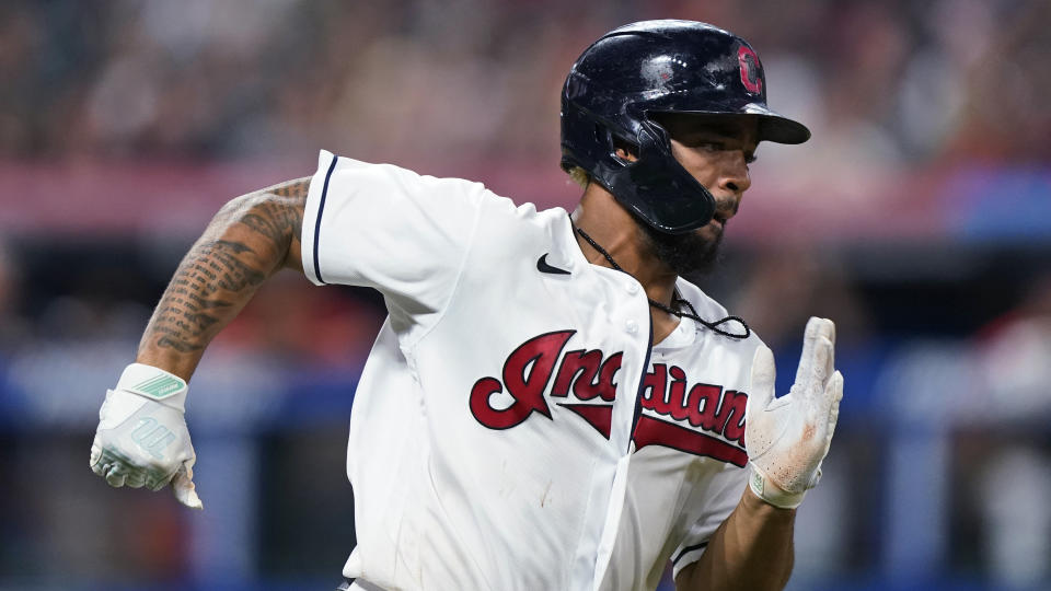 Cleveland Indians' Bobby Bradley runs to first with an RBI single in the sixth inning of the team's baseball game against the Seattle Mariners, Friday, June 11, 2021, in Cleveland. (AP Photo/Tony Dejak)