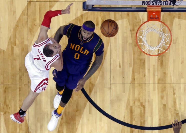 DeMarcus Cousins hits the floor in his Pelicans debut. (AP)