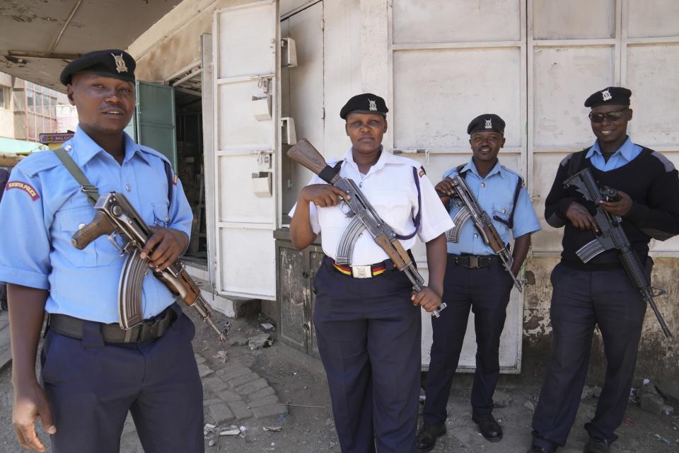 FILE - Kenya police patrol the streets of Nairobi, Kenya Tuesday, March 12, 2024. Hundreds of Kenyan police officers are leaving for Haiti, where they will lead a multinational force against powerful gangs. (AP Photo/Brian Inganga, File)