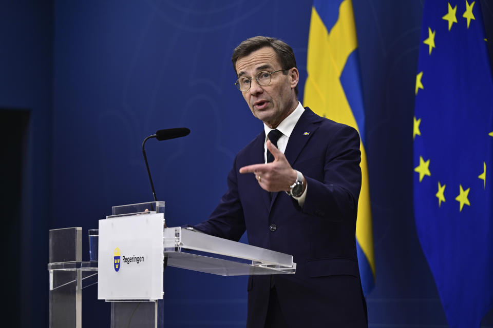 Sweden's Prime Minister Ulf Kristersson holds a press conference at the government headquarters after Hungary's parliament voted yes to ratify Sweden's NATO accession, in Stockholm, Sweden, on Monday Feb. 26, 2024. (Magnus Lejhall/TT News Agency via AP)