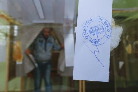 A man votes in a polling station during parliamentary elections in Sofia, Bulgaria March 26, 2017. REUTERS/Laszlo Balogh