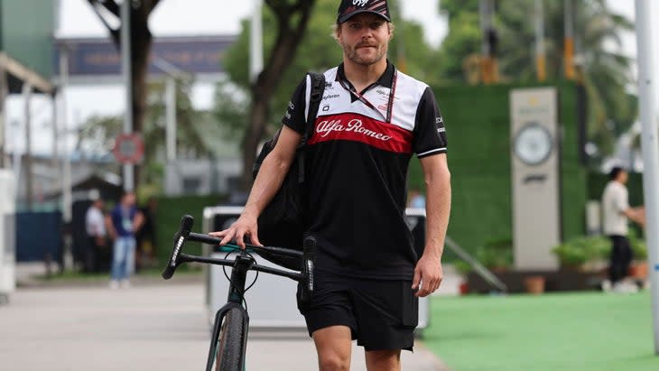 <span class="article__caption">Bottas rarely travels without his bike. </span> (Photo: Getty Images)