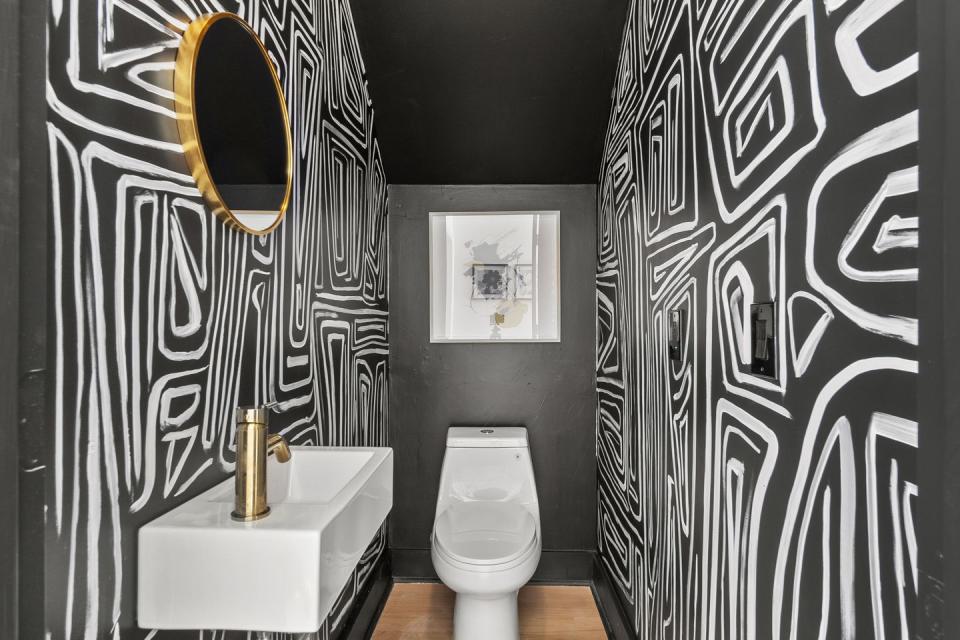 An Under-the-Stairs Wet Bar Turned Powder Room