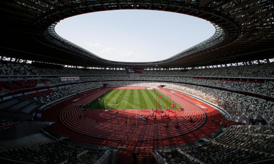 <span>The National Stadium, the centre of the Tokyo Olympics in 2021.</span><span>Photograph: Shuji Kajiyama/AP</span>