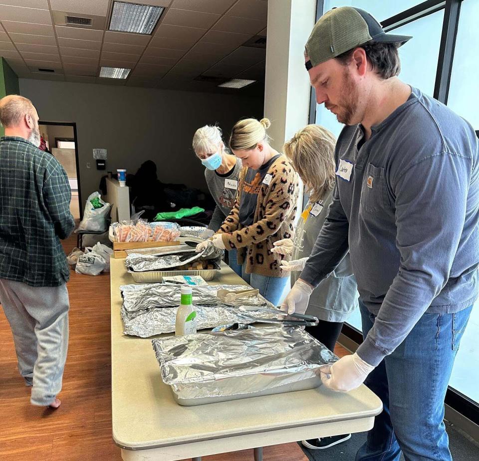 Volunteers are the key to success at Fig Tree Knoxville during the worst of the snowstorm Tuesday, Jan. 16, 2024. From left: Melinda Christian, Kailyn Pack, Carol Beebe and Carter Pack.