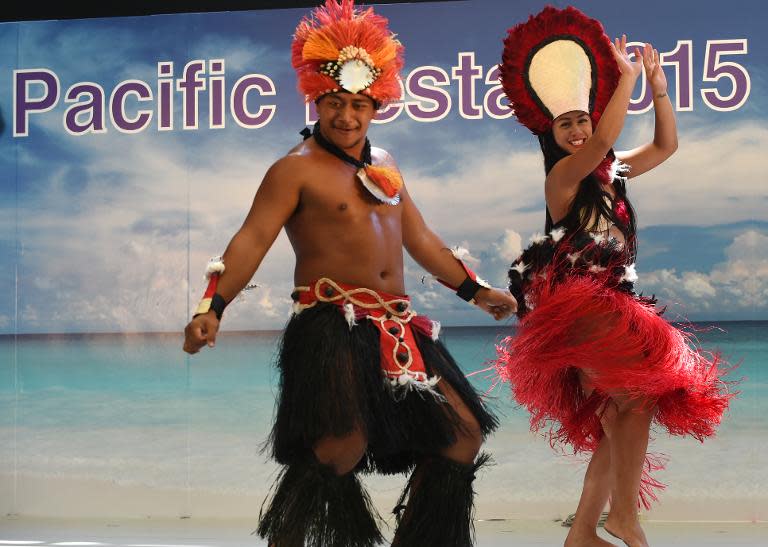 Dancers from Cook Islands perform onstage during the Pacific Festa in Tokyo, on May 21, 2015