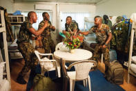 A group of United Nations military roommates from Nigeria posted in Monrovia, dance while packing their belongings at their base, as their departure approaches, Liberia January 12, 2018. Albert Gonzalez Farran/UNMIL/Handout via REUTERS