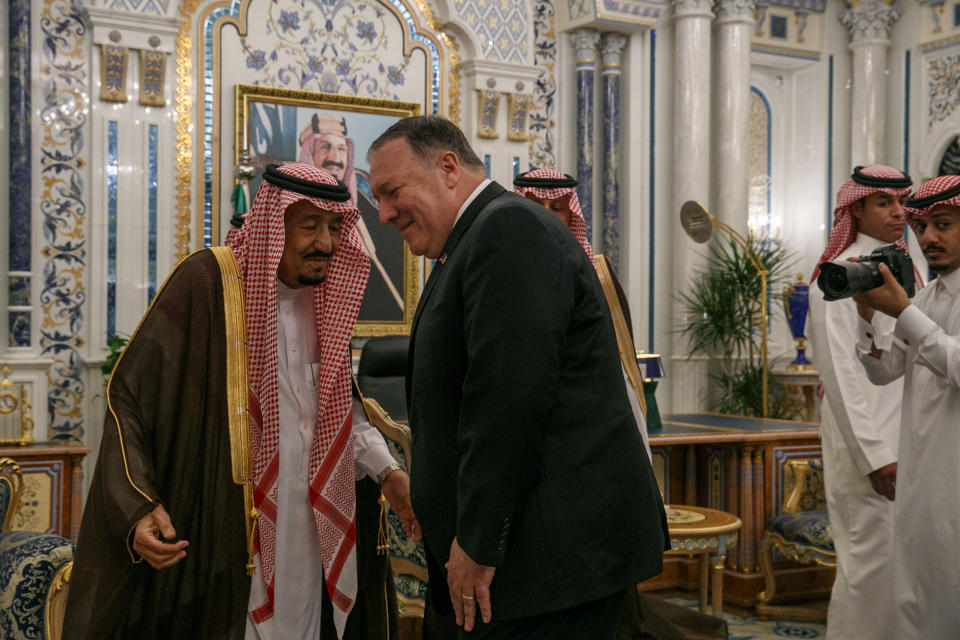 Secretary of State Mike Pompeo leans in to greet Saudi Arabia's King Salman during their meeting at Al-Salam Palace in Jiddah, Saudi Arabia, Monday, June 24, 2019. (AP Photo/Jacquelyn Martin, Pool)