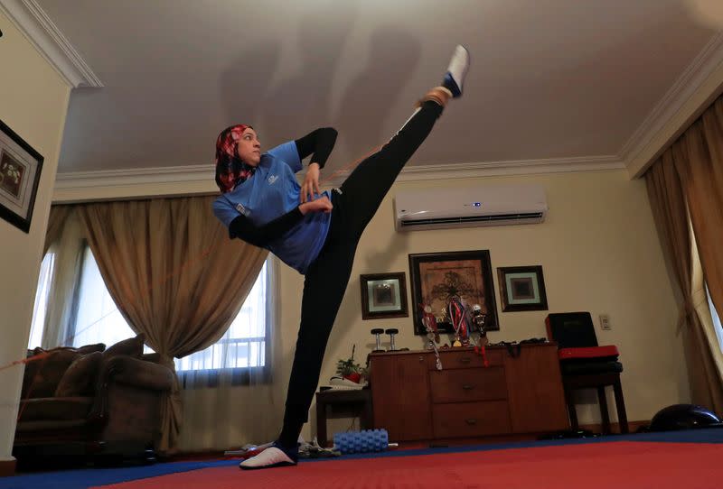 Egyptian Taekwondo practitioner and 2016 Rio Olympics bronze medallist Wahba works out at her home amidst the spread of the coronavirus disease (COVID-19) in Cairo