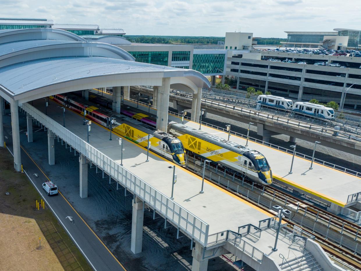 Brightline trains at Orlando International Airport train station.