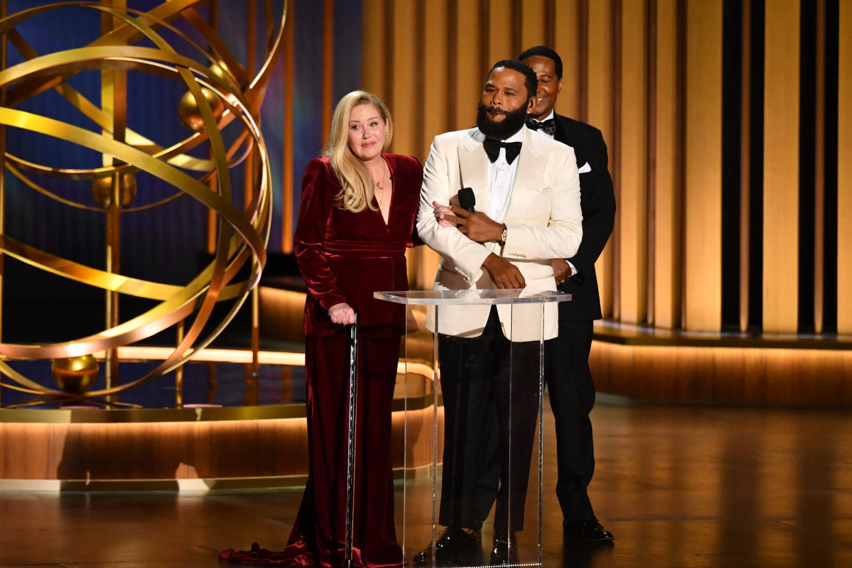 Actor Anthony Anderson and US actress Christina Applegate speak onstage during the 75th Emmy Awards at the Peacock Theatre at L.A. Live in Los Angeles on January 15, 2024. (Photo by Valerie Macon / AFP) (Photo by VALERIE MACON/AFP via Getty Images)