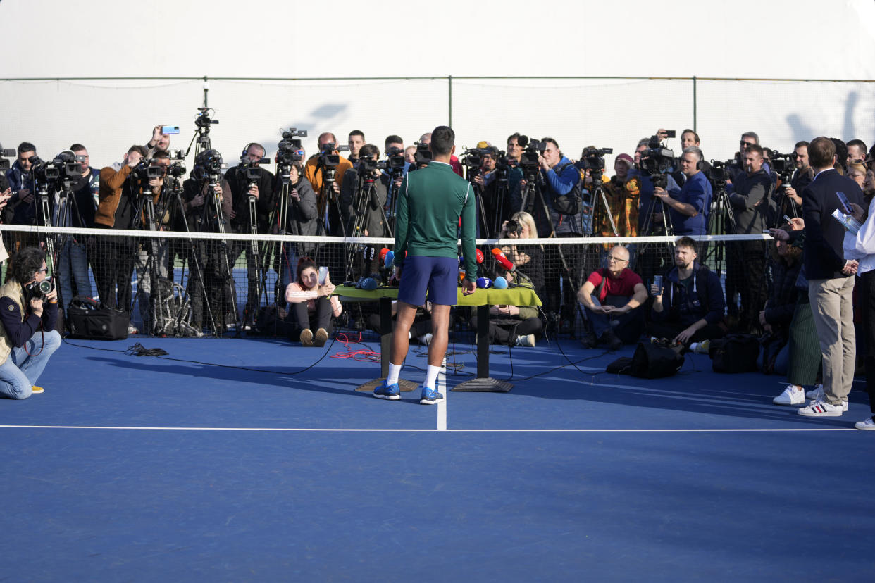 Serbian tennis player Novak Djokovic speaks during a press conference after his open practise session in Belgrade, Serbia, Wednesday, Feb. 22, 2023. Djokovic said Wednesday he still hopes US border authorities would allow him entry to take part in two ATP Masters tennis tournaments despite being unvaccinated against the coronavirus. (AP Photo/Darko Vojinovic)