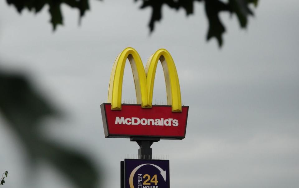 he McDonald's logo is seen above a restaurant on July 27, 2022. Source: Getty Images 