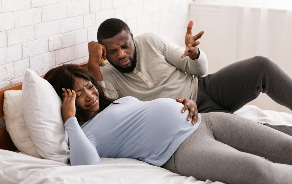 couple arguing when the woman is pregnant