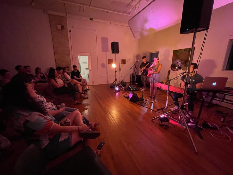 Paige Hargrove performs with Zach Pietrini on keyboard and Josh Miranda on guitar at a Sofar Show on June 15 at Between Two Galleries, located inside the Var Gallery building.